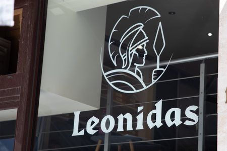 Bordeaux , Aquitaine France - 04 17 2023 : Leonidas logo brand and sign text wall windows facade shop entrance of Belgian Chocolates famous storeのeditorial素材