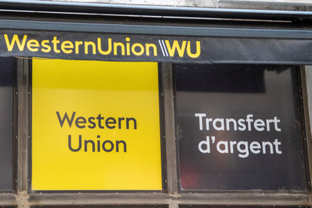lyon , Aura France - 04 24 2023 : Western Union wu sign text and brand logo on entrance facade...
