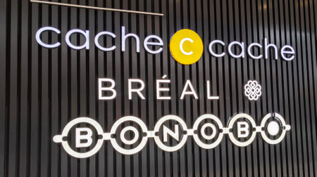 lyon , Aura France - 04 27 2023 : Cache Cache bonobo breal brand sign and logo text chain wall facade of shop entrance for fashion clothes store and clothing boutiqueのeditorial素材