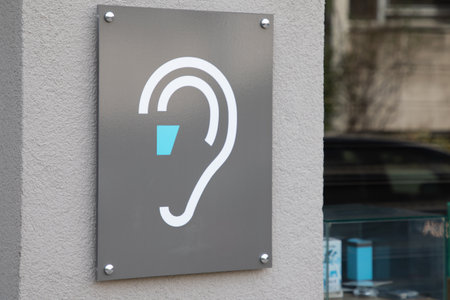 lyon , Aura France - 04 24 2023 : Audilab logo brand and text sign front wall facade entrance shop medical hearing aid store officeのeditorial素材