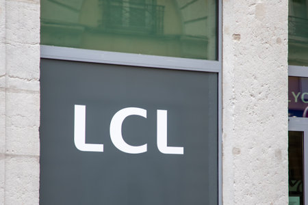 lyon , Aura France - 04 24 2023 : LCL logo brand and sign text windows facade front entrance bank signageのeditorial素材