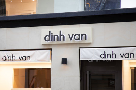 lyon , Aura France - 05 01 2023 : Dinh Van jewelery boutique logo brand and text sign front facade...