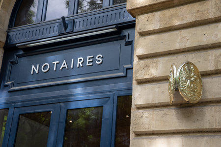 lyon , Aura France - 05 01 2023 : Notaire facade golden copper brand logo and sign text facade symbol on notary french wall signage building officeのeditorial素材