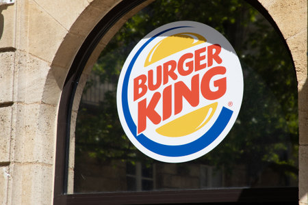 Bordeaux , Aquitaine France - 02 27 2023 : Burger king logo brand and text sign fastfood hamburger us chain restaurant facade entranceのeditorial素材