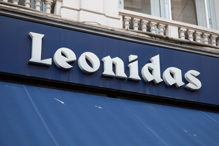 Bordeaux , Aquitaine France - 05 02 2023 : Leonidas logo brand and sign text entrance wall blue facade shop entrance of Belgian Chocolates chainのeditorial素材