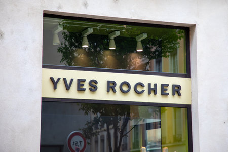 lyon , Aura France - 04 27 2023 : Yves Rocher sign logo and text brand storefront of facade store fashion boutique chain entrance French beauty products groupのeditorial素材