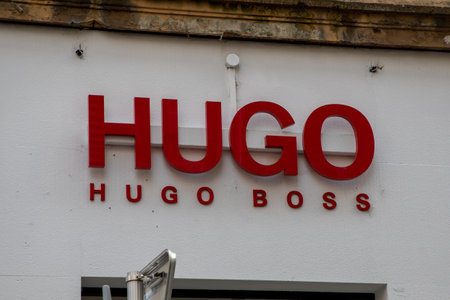 Bordeaux , Aquitaine France - 05 19 2023 : Hugo Boss logo text and brand sign on wall entrance facade store German luxury fashion style house shopのeditorial素材