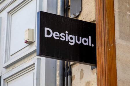 Bordeaux , Aquitaine France - 06 01 2023 : desigual brand logo and text sign on entrance wall facade shop on spanish store clothesのeditorial素材
