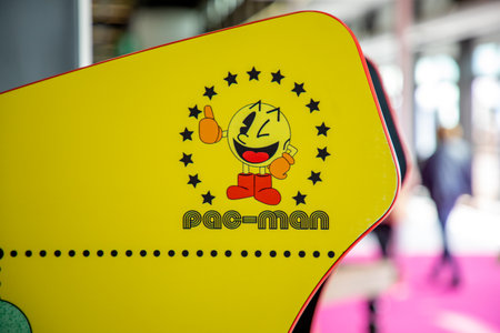 Bordeaux , Aquitaine France - 06 01 2023 : Pac-Man logo sign icon on maze arcade game yellow video vintage consoleのeditorial素材