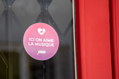 Bordeaux , France - 07 01 2023 : SACEM logo brand and text sign professional association french Society of Authors Composers and Music Publishers sticker on windows facade shopのeditorial素材
