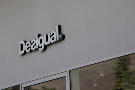 Milan , Italy - 07 10 2023 : desigual logo brand and text on shop facade wall sign chain boutique in the main shopping street of the cityのeditorial素材