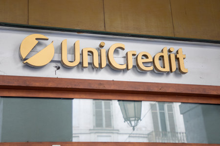 Milan , Italy - 07 10 2023 : Unicredit bank text sign and logo brand Bank on wall office facade entrance agency Italian global banking corporationのeditorial素材