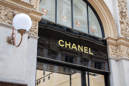 Milan , Italy - 07 10 2023 : Chanel logo chain and sign front facade Retail Store Exterior French fashion brand textのeditorial素材