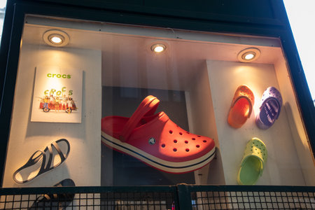 Milan , Italy - 07 10 2023 : crocs text sign and logo brand front facade shop chain American footwear company store manufactured foam clog plastic shoes shopのeditorial素材