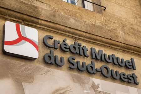 Bordeaux , Aquitaine France - 07 10 2023 : Credit Mutuel du Sud-Ouest logo text and brand sign on entrance french southwest bank office on building agency facadeのeditorial素材