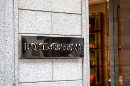 Milan , Italy - 07 05 2023 : Dolce & Gabbana shop logo brand and text sign entrance facade of Italian luxury industry store fashion houseのeditorial素材