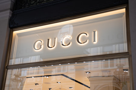 Milan , Italy - 07 10 2023 : gucci store sign text and brand logo on windows facade entrance luxury leather bag italian shopのeditorial素材