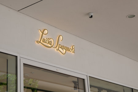 Milan , Italy - 07 29 2023 : Luisa spagnoli logo sign and brand text facade wall entrance windows...