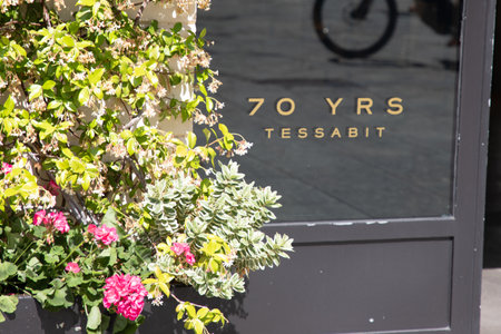 Milan , Italy - 09 06 2023 : tessabit 70 years sign text store and logo brand shop on boutique...
