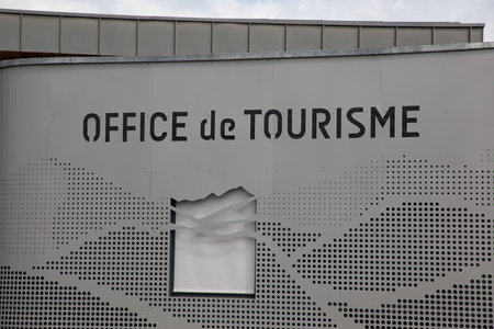 pau , France - 08 28 2023 : office de tourisme logo text and brand sign on facade wall building means information center in french for tourist tour help in gray steelのeditorial素材