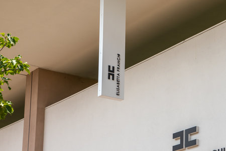 Milan , Italy - 09 06 2023: Elisabetta Franchisee sign text facade shop wall and logo brand store chain on entrance boutique fashion clothes in main streetのeditorial素材