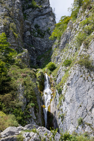 pyrenees french south mountain waterfall natural rock and vegetation fall water landscapeの写真素材
