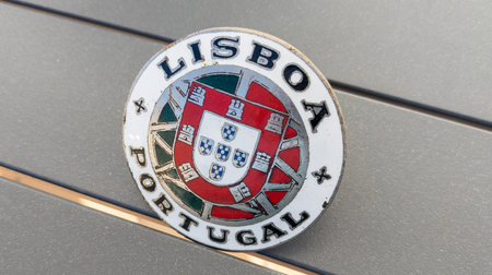 Lisbon, Portugal 10 09 2023: Lisboa Vintage old enameled car flat grille as a tourist souvenirのeditorial素材