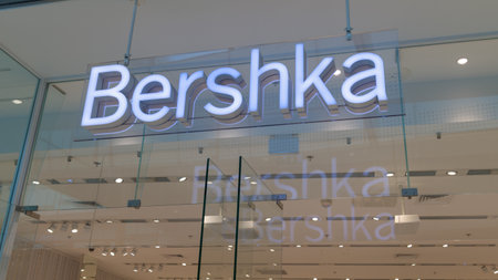 Bordeaux , France - 11 04 2023: Bershka logo brand boutique and sign text windows front wall facade of store fashion chain clothes shop entranceのeditorial素材
