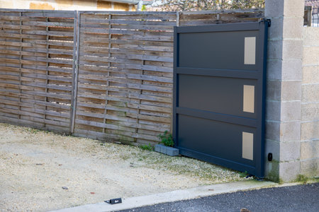 gray aluminum modern open high gate home gray modern portal of suburb city houseの写真素材