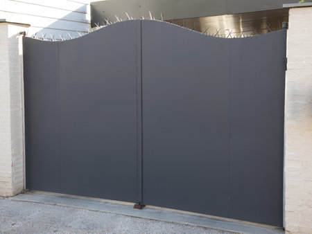 portal gray dark home steel door metal gate with aggressive protection against burglar intrusion