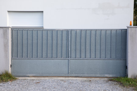entry raw brut gray metal house silver slide portal door of private house