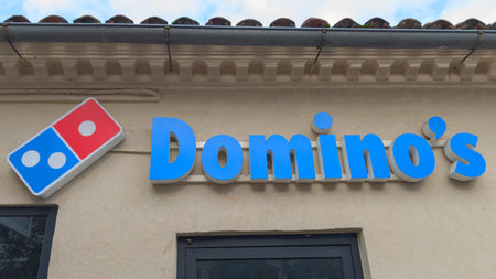 Bordeaux , France - 10 06 2023: Dominos pizza logo text and sign brand on wall entrance restaurant...
