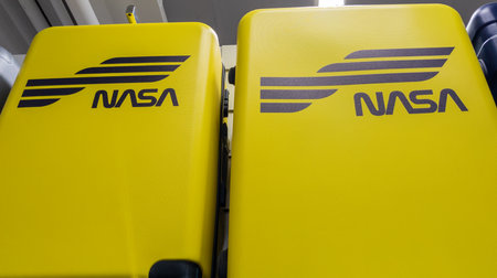 Bordeaux , France - 12 17 2023: NASA brand logo and text sign on travel suitcase cabin yellow in...