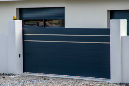 dark gray slide aluminum and silver chrome gate sliding portal of suburb house door entry