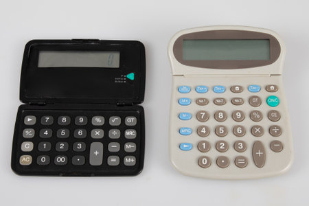 retro two vintage calculator black white technology for school math and accounting with analog rubber buttonsの写真素材