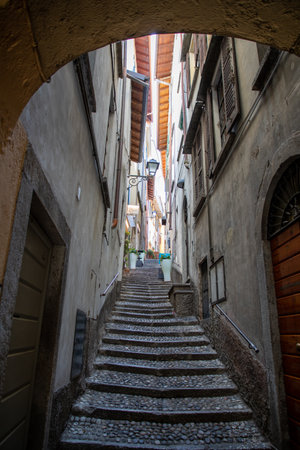 Bellagio city narrow alley with cobbled steps in Lake Como italyの写真素材