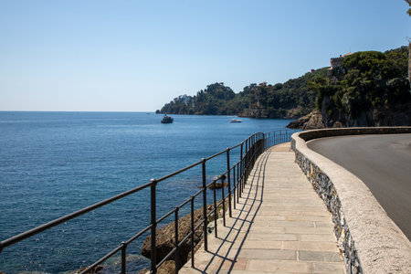 Portofino pedestian access pathway to Santa Margherita Ligure in sea coast Italy in summer dayの写真素材