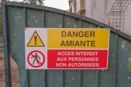 danger asbestos access prohibited to unauthorized persons french panel sign text means asbestos...