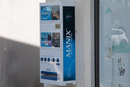 Bordeaux , France -  04 11 2024 : manix logo sign and brand text on health condoms automat machine...