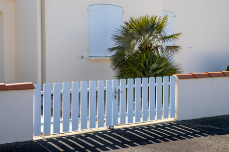 low modern white gate aluminum portal design of suburban houseの写真素材