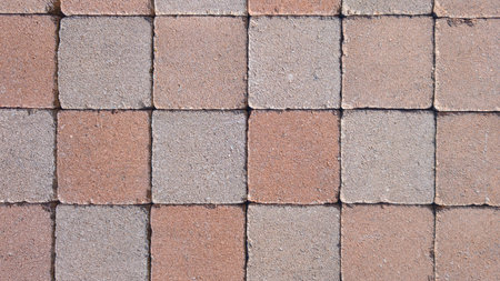 tiled red ancient brick floor background with old vintage stones tilesの写真素材