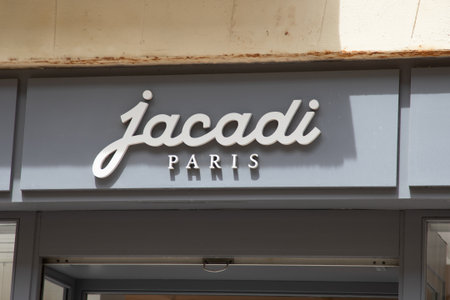 Bordeaux , France - 06 15 2024: Jacadi Paris text logo and brand sign facade boutique clothing shop...