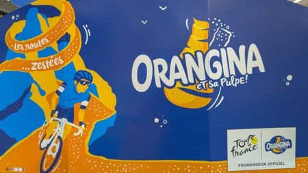Bordeaux , France - 07 17 2024: Orangina carbonated orange lemonade logo sign and brand text on tour de france advertising yellow soda glassのeditorial素材