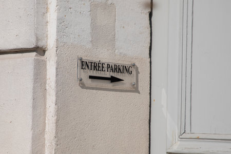 parking car road panel signage and arrow sign access entranceの写真素材