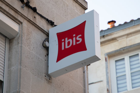La Rochelle , France - 07 23 2024: ibis red pillow sign logo and brand text pf french chain hotel wall building windowsのeditorial素材