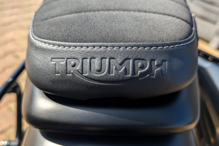 La Rochelle, France - 08 06 2024: Triumph scrambler street bonneville seat logo text and brand sign vintage classic bike back viewのeditorial素材