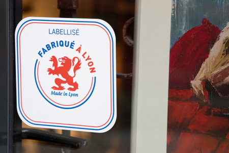 Lyon , France - 08 28 2024: Lyon factory a made in lyon french text city in south east france logo brand and label sign on shop windows facade storeのeditorial素材