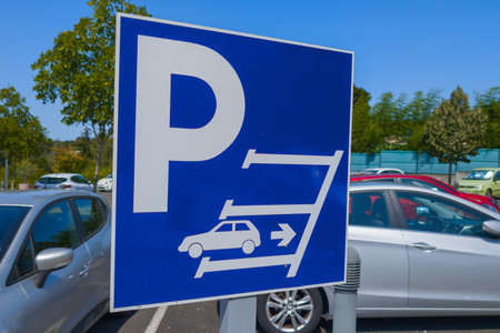 Reverse car parking only sign blue outdoor park vehicle rules tips areaの写真素材