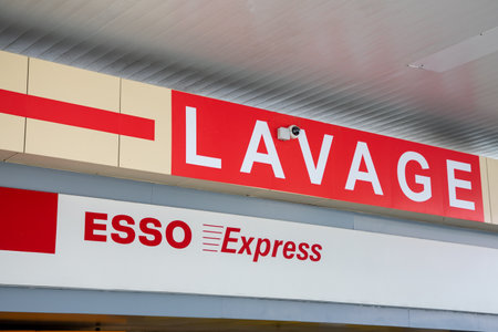 Bordeaux, France - 09 07 2024: Esso Express wash logo text and sign lettering at gas station for car...