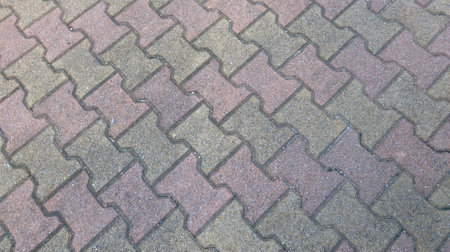 floor sidewalk brick pavement self-locking paving stone backgroundの写真素材